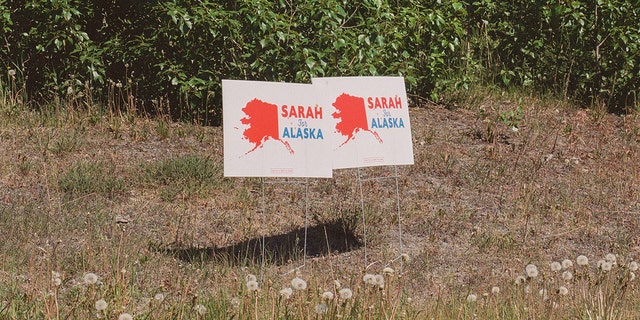 Signs in support of Sarah Palin stand on a corner in south Anchorage. 