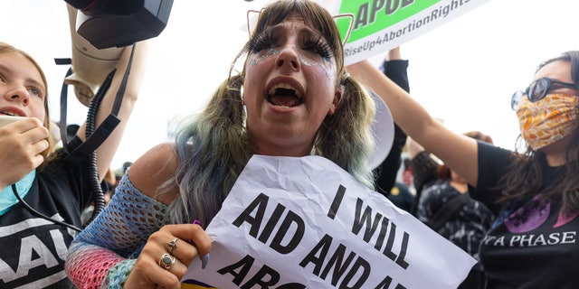 Protesters demonstrate outside the Supreme Court after a landmark abortion decision struck down Roe v. Wade, Friday, June 24, 2022.