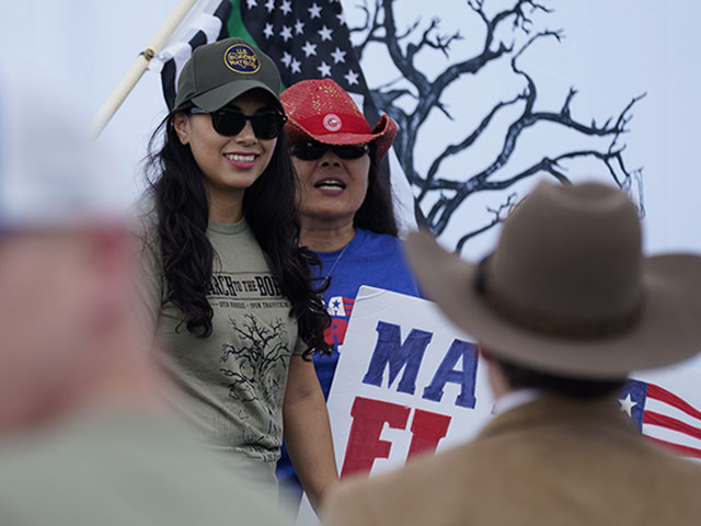 In this Saturday, Sept. 25, 2021, photo Republican congressional candidate Mayra Flores, left, attends a March to the Border event in McAllen, Texas. Flores argues that Democrats are forcing Texans choose between their energy sector jobs and curbing climate change. (AP Photo/Eric Gay)