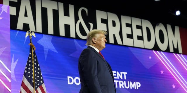 Former President Donald Trump walks on to the stage to speak at the Road to Majority conference Friday, June 17, 2022, in Nashville, Tenn.