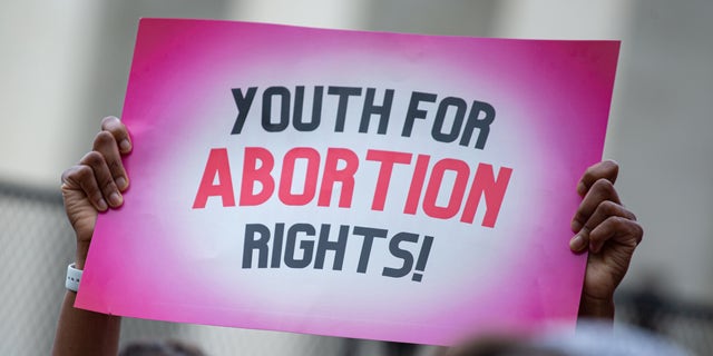 Youth pro-abortion rights demonstrators with Generation Ratify and other organizations rally outside of the Supreme Court in Washington, D.C. on May 5, 2022, following the leak of a draft Supreme Court opinion to overthrow Roe vs. Wade.