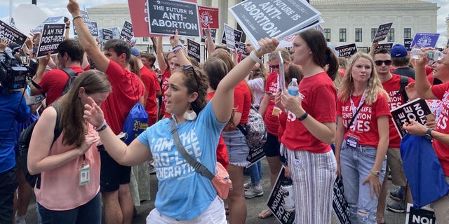 Pro-life activists react to the landmark Supreme Court decision overruling Roe vs. Wade.