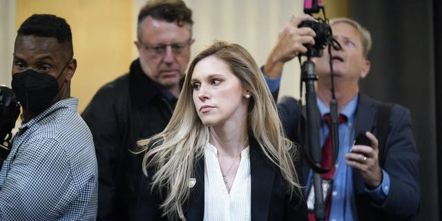 U.S. Capitol Police officer Caroline Edwards arrives as the House select committee investigating the Jan. 6 attack on the U.S. Capitol prepares to hold its first public hearing to reveal the findings of a year-long investigation, at the Capitol in Washington, Thursday, June 9, 2022. 