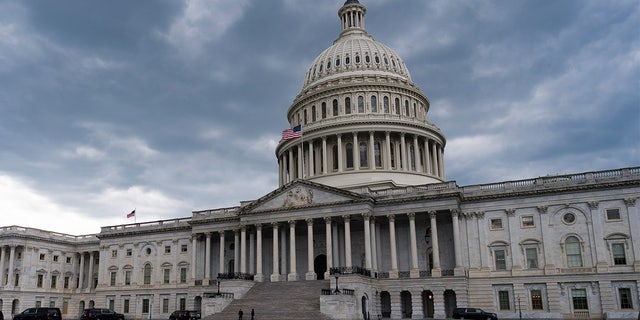 The Capitol is seen under cloud cover in Washington, Tuesday, May 11, 2021. (AP Photo/J. Scott Applewhite) .