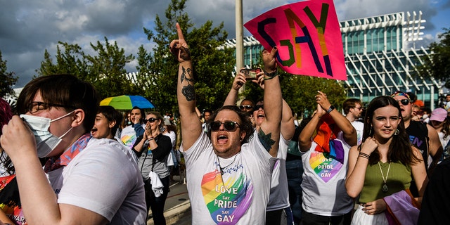 Members and supporters of the LGBTQ community attend the "Say Gay Anyway" rally in Miami Beach, Florida on March 13, 2022.