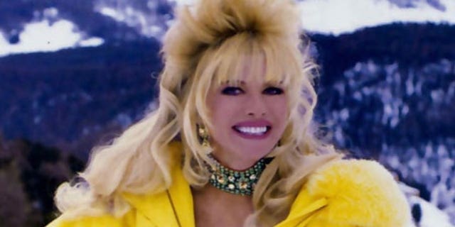 Ivana Trump wears a yellow jacket. 