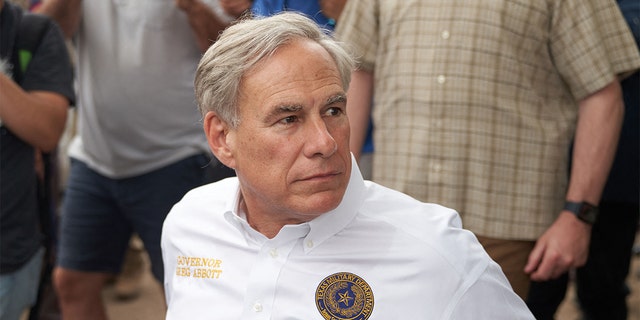 Texas Gov. Greg Abbott tours the U.S.-Mexico border at the Rio Grande River in Eagle Pass, Texas, on May 23, 2022. (Photo by ALLISON DINNER/AFP via Getty Images)