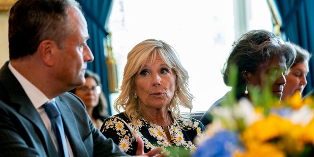 Ukraine's Ambassador to the United States, Oksana Markarova, second from left, joins Olena Zelenska, the first lady of Ukraine