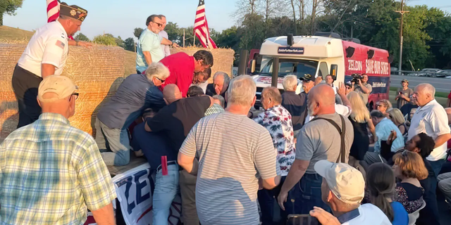 Congressman Lee Zeldin stands on stage during his stump speech, before an alleged attack on him, in Fairport, New York, United States, July 21, 2022.