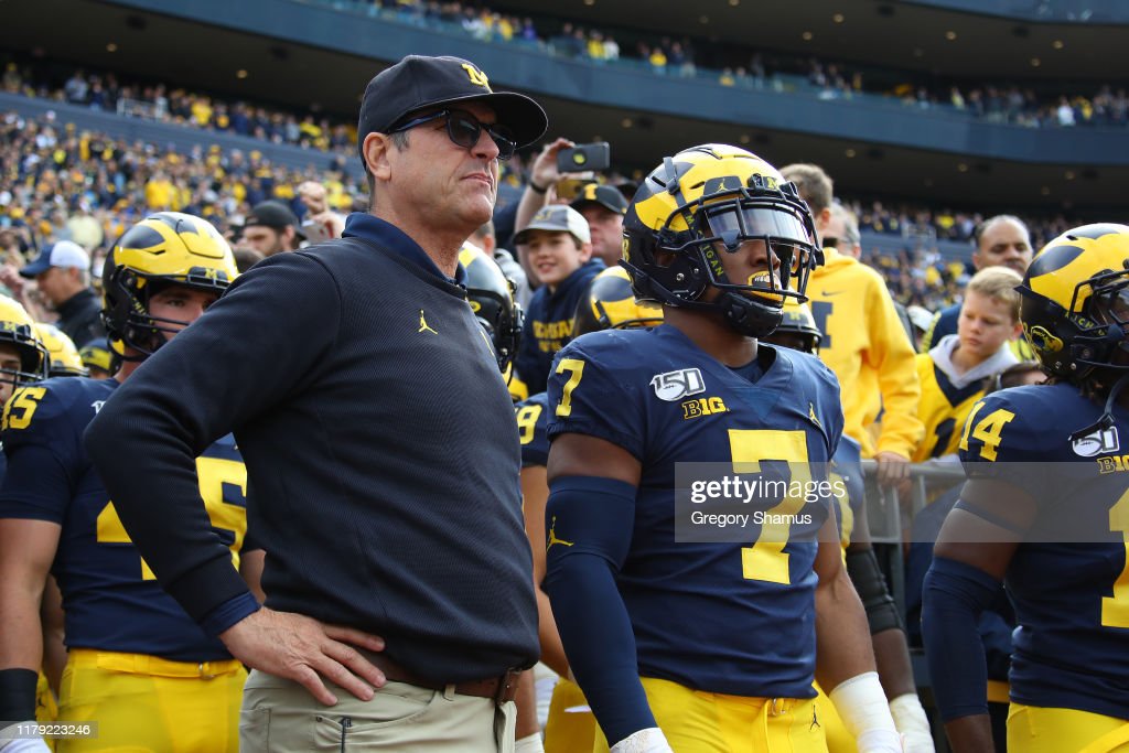 Head coach Jim Harbaugh waits to take the field to play the Iowa Hawkeyes at Michigan Stadium on October 05, 2019 in Ann Arbor, Michigan. Michigan...