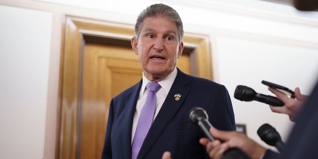 Sen. Joe Manchin was pressed on whether he would support President Biden if he ran for re-election in 2024, prompting him to say he was not going to "get into the 2024 election." 