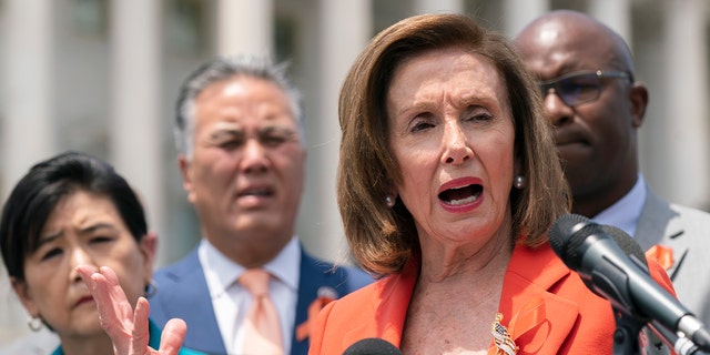 House Speaker Nancy Pelosi, D-Calif., with other Democratic leaders, speaks during a news conference on Capitol Hill in Washington June 8, 2022. 