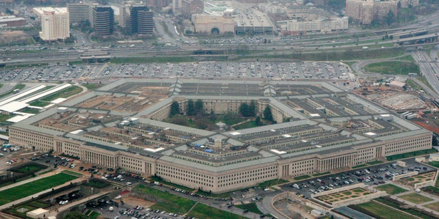 FILE - This March 27, 2008, file photo, shows the Pentagon in Washington. The U.S. Army, for the first time, is offering a maximum enlistment bonus of $50,000 to highly skilled recruits who sign up for six years. (AP Photo/Charles Dharapak, File)