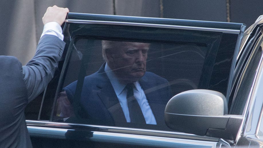 Donald Trump leaves Trump Tower