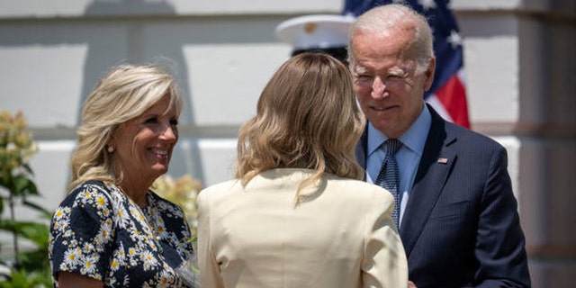 First lady Jill Biden and President Biden greet first lady Olena Zelenska as Zelenska arrives on the South Lawn of the White House, July 19, 2022.