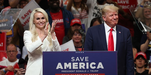 Republican U.S. Senate candidate Kelly Tshibaka (L) stands on stage with former U.S. President Donald Trump (R) during a "Save America" rally at Alaska Airlines Center on July 09, 2022 in Anchorage, Alaska.  (Photo by Justin Sullivan/Getty Images)