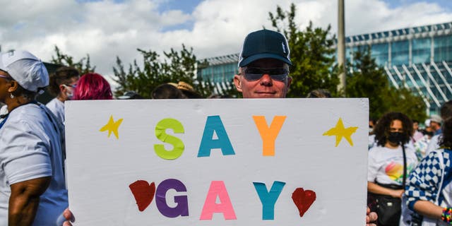 Members and supporters of the LGBTQ community attend the "Say Gay Anyway" rally in Miami Beach, Florida on March 13, 2022.