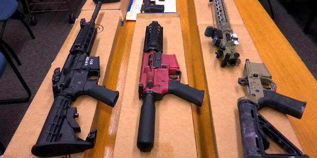 FILE - This Nov. 27, 2019, file photo shows "ghost guns" on display at the headquarters of the San Francisco Police Department in San Francisco. 