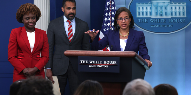 White House Domestic Policy Adviser Susan Rice (R) speaks on President Biden’s announcement of student loan debt forgiveness as White House Press Secretary Karine Jean-Pierre (L) and Deputy Director of the National Economic Council Bharat Ramamurti (2nd L) listen during a White House daily press briefing.