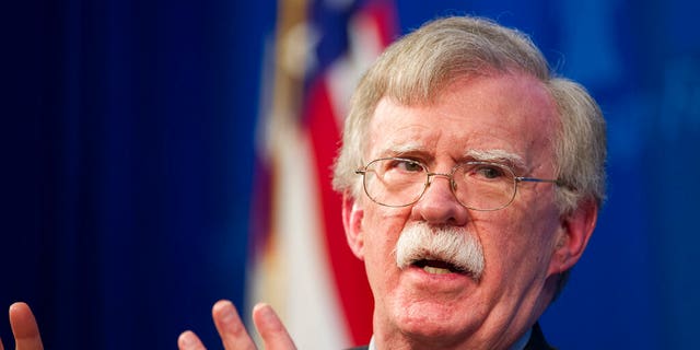 FILE - In this Dec. 13, 2018 file photo, national security adviser John Bolton unveils the Trump Administration's Africa Strategy at the Heritage Foundation in Washington.  (AP Photo/Cliff Owen, File)