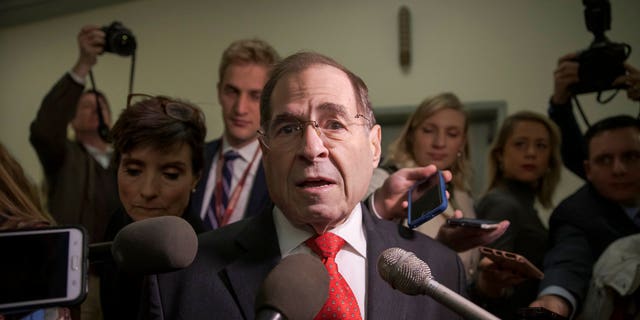 Rep. Jerrold Nadler, D-N.Y., the top Democrat on the House Judiciary Committee, is met by reporters as he arrives for testimony by former FBI Director James Comey behind closed doors on Capitol Hill in Washington, Friday, Dec. 7, 2018.