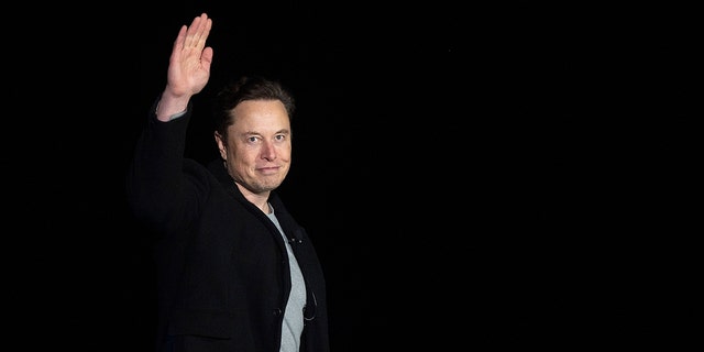 Elon Musk gestures as he speaks during a press conference at SpaceX's Starbase facility near Boca Chica Village in South Texas on February 10, 2022.