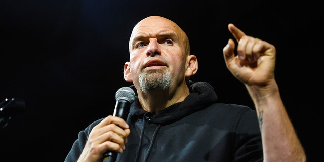 Senate candidate John Fetterman speaks during a campaign rally in Erie, Pennsylvania, on Aug. 12, 2022.