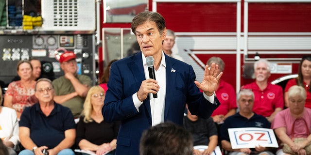 Republican Senate candidate Mehmet Oz holds a rally in the Triton Hose Company fire station in Tunkhannock, Pennsylvania, on Aug. 18, 2022.