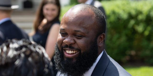 Ja'Ron Smith, special assistant to President Donald Trump for Domestic Policy, attends President Trump's unveiling of a new legal immigration proposal in the Rose Garden of the White House, on Thursday, May 16, 2019.