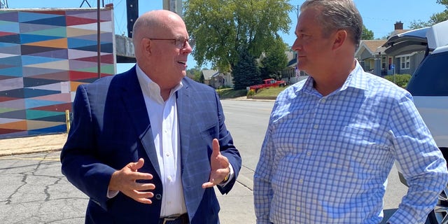 Republican Gov. Larry Hogan of Maryland (left) with GOP Rep. Don Bacon of Nebraska (right), on August 10, 2022 in Omaha, Nebraska 