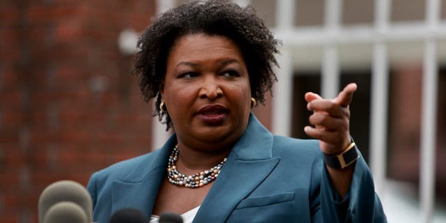 Democratic gubernatorial candidate Stacey Abrams speaks to the media during a press conference at the Israel Baptist Church as voters head to the polls during the Georgia primary on May 24, 2022 in Atlanta, Georgia.