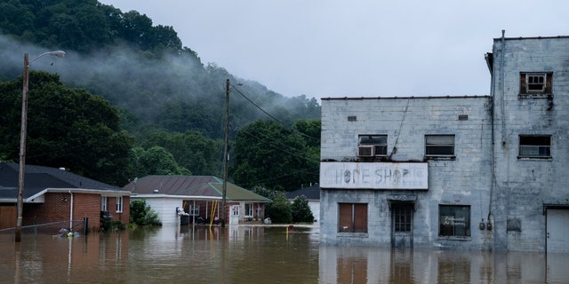 Flooding in downtown Jackson, Kentucky on July 29, 2022 in Breathitt County, Kentucky. At least 16 people have been killed and hundreds had to be rescued amid flooding from heavy rainfall. 