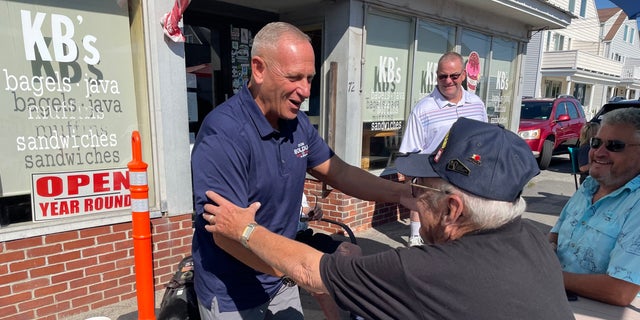 Retired Army Gen. Don Bolduc, a Republican Senate candidate in New Hampshire, speaks with supporters in Hampton Beach, New Hampshire, on Sept. 12, 2022