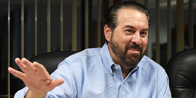 Arizona Attorney General Mark Brnovich gestures and smiles during his visit to the Yuma Sun in Yuma, Ariz., Thursday morning, June 2, 2022. A new Arizona law banning abortions after 15 weeks of pregnancy takes effect Saturday, Sept. 24, 2022 as a judge weighs a request to allow a pre-statehood law that outlaws nearly all abortions to be enforced. 