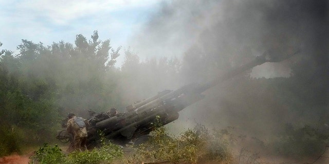 Ukrainian soldiers fire at Russian positions from a U.S.-supplied M777 howitzer in Ukraine's eastern Donetsk region June 18, 2022. U.S. officials will send another $450 million in military aid to Ukraine. (AP Photo/Efrem Lukatsky, File)