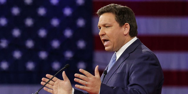 In this photo from Feb. 24, 2022, Florida Gov. Ron DeSantis delivers remarks at the 2022 CPAC conference at the Rosen Shingle Creek in Orlando. 