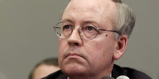 Independent counsel Kenneth Starr reading from the United States Constitution during the Clinton impeachment inquiry of the House Judiciary Committee on Nov. 19, 1998.