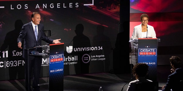 Businessman Rick Caruso faces Congresswoman Karen Bass during the Los Angeles mayoral debate at the Skirball Cultural Center on Wednesday, Sept. 21, 2022, in Los Angeles. 