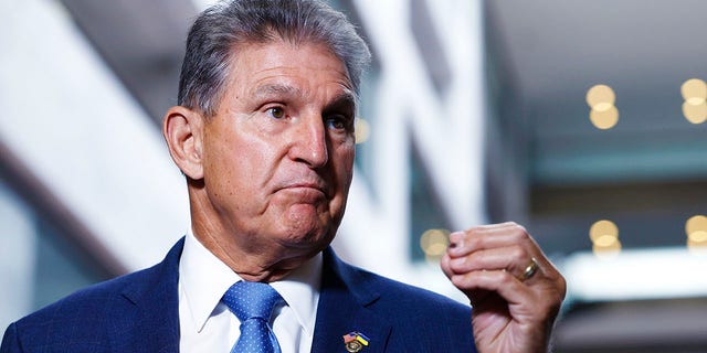 WASHINGTON, DC - AUGUST 01: Sen. Joe Manchin (D-W.V.) gestures as he speaks to reporters in the Hart Senate Office building on August 01, 2022 in Washington, DC. Manchin, who returned to Capitol Hill after quarantining with Covid-19, spoke to reporters about the deal he reached with Senate Majority Leader Chuck Schumer (D-NY) on the Inflation Reduction Act of 2022. 