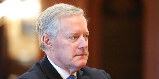 FILE - Former White House Chief of Staff Mark Meadows listens during an announcement of the creation of a new South Carolina Freedom Caucus based on a similar national group at a news conference on April 20, 2022 in Columbia, S.C. Meadows accused the congressional committee investigating last year's attack on the U.S. Capitol of leaking all of the text messages he provided to the panel in what he says was an effort to vilify him publicly. 