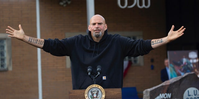 Lt. Gov. and Democratic Senate candidate John Fetterman speaks to a crowd at a United Steel Workers of America Labor Day event with President Biden in West Mifflin, Pennsylvania, just outside Pittsburgh, Sept. 5, 2022.