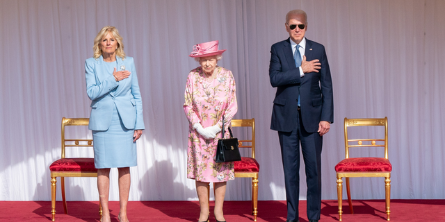 Queen Elizabeth II stands with US President Joe Biden and First Lady Jill Biden during their visit to Windsor Castle on June 13, 2021, in Windsor, England. Queen Elizabeth II hosts US President, Joe Biden and First Lady Dr Jill Biden at Windsor Castle.