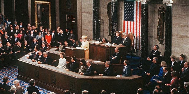 Queen Elizabeth II addresses a joint session of Congress in the House Chamber in May 1991 in Washington, D.C.