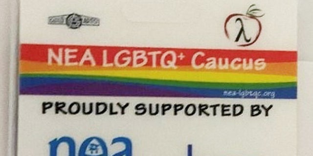 A photograph of the NEA LGBTQ+ Caucus badge that has been given to some educators in the Hilliard School District.
