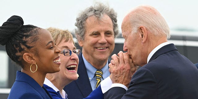 President Biden is greeted, from left to right, by U.S. representatives Shontel Brown and Marcy Kaptur and U.S. Sen. Sherrod Brown upon his arrival at Cleveland Hopkins International Airport in Cleveland July 6, 2022.