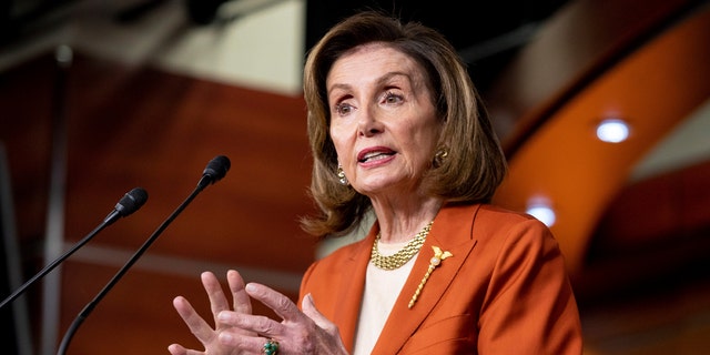 Speaker of the House Nancy Pelosi, D-Calif., speaks to reporters during her weekly press conference at the Capitol in Washington, Thursday, Jan. 13, 2022. 