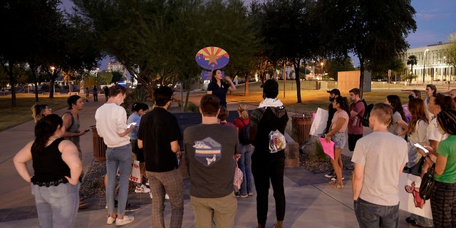 Protesters gather outside the Capitol to voice their dissent with an abortion ruling, Friday, Sept. 23, 2022, in Phoenix. 