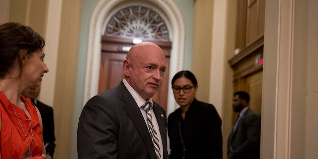 Democratic Arizona Senator Mark seen in a photo outside the Senate chamber.