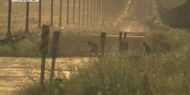 Migrants were seen running into the U.S. at the border in Naco, Arizona, in Fox News video.