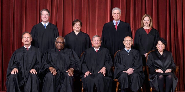 Seated from left to right: Justices Samuel A. Alito, Jr. and Clarence Thomas, Chief Justice John G. Roberts, Jr., and Justices Stephen G. Breyer and Sonia Sotomayor   Standing from left to right: Justices Brett M. Kavanaugh, Elena Kagan, Neil M. Gorsuch, and Amy Coney Barrett.